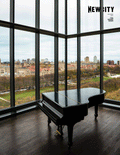 A black grand piano sits in front of floor-to-ceiling windows overlooking a cityscape with trees and tall buildings, evoking the vibrant Chicago music culture, as featured on the cover of the December 2023 Issue: The Music Issue (Digital Edition). "NEWCITY" is written in the top right corner.