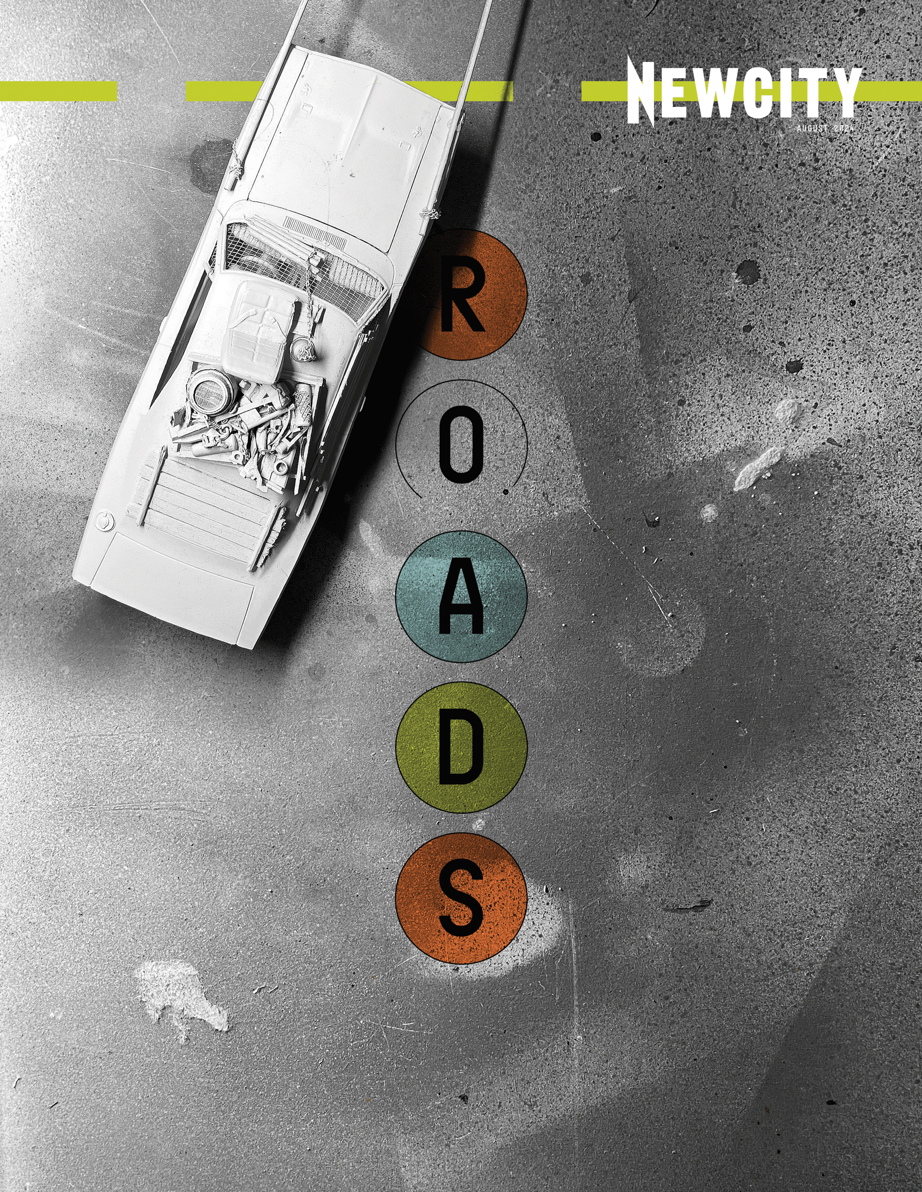 A toy car on a textured gray surface evokes the energy of the Chicago art scene, with "August 2024 Issue: Roads (Print Edition)" by NEWCITY at the top and "ROADS" spelled vertically in colored circles below the car.