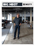 A man with glasses and gray hair stands in a modern open office space. The cover of the April 2019 Issue: Big Heat Food & Drink 50 features headlines such as BIG HEAT, NEWCITY, and Nick Kokonas: Restaurateur of the Moment, celebrating his leadership among the behind-the-kitchen players shaping Chicago’s dining scene.