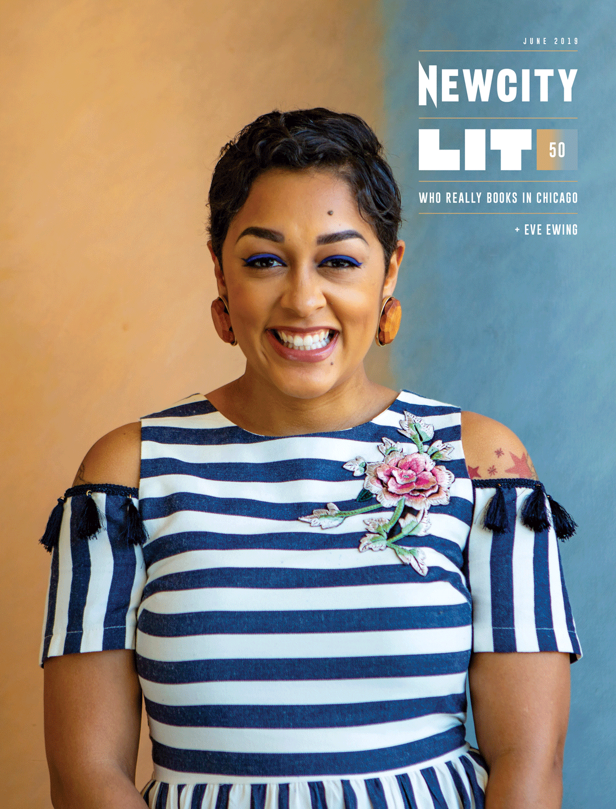 A smiling woman, dressed in a striped dress with floral embroidery, stands against a two-tone background. The text reads: “June 2019 Issue: Lit 50 – Who really books in Chicago – Eve L. Ewing.”.