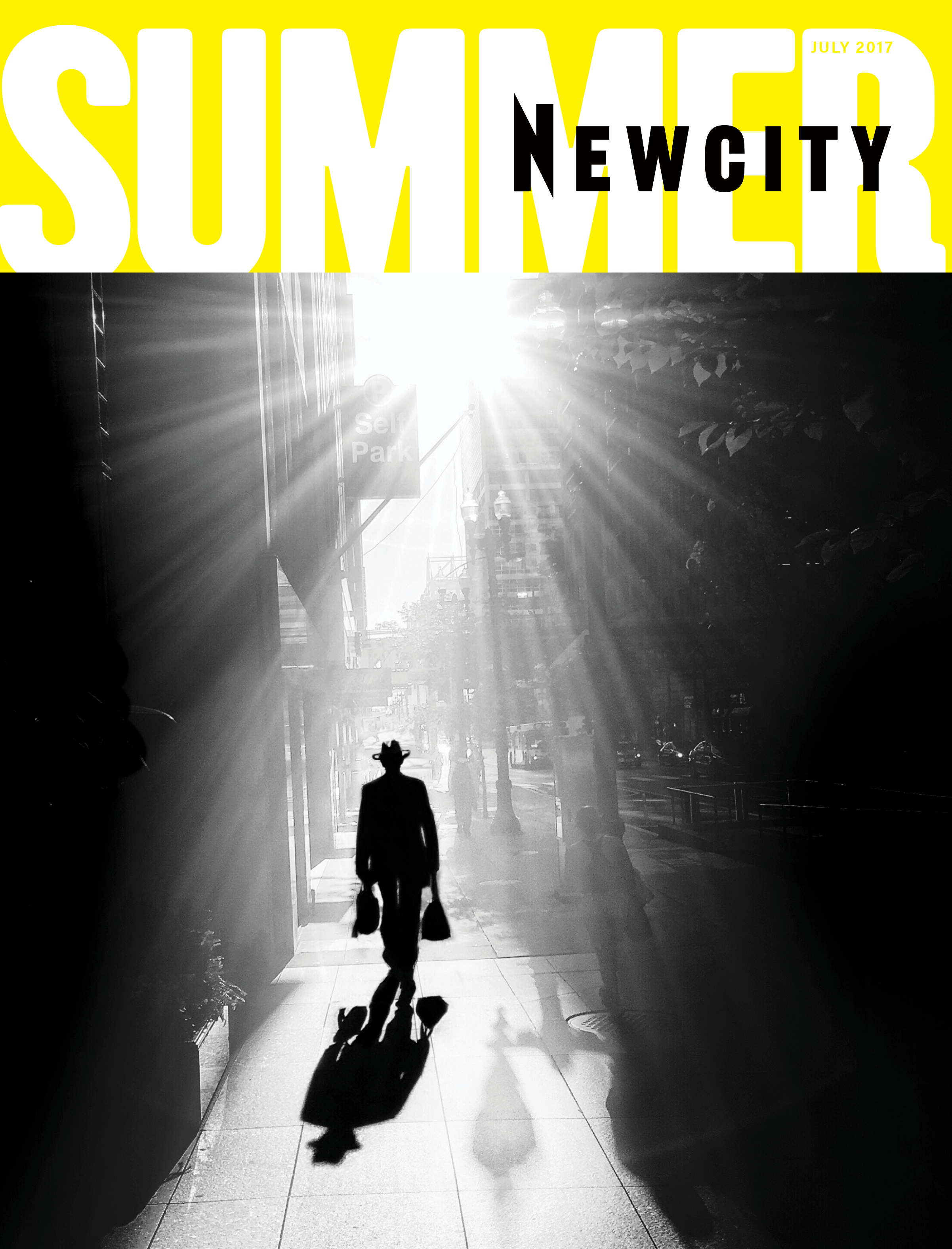 A person carrying bags walks down a sunlit city sidewalk, their shadow stretching behind them—evoking the purposeful stride of Victorian mail carriers. Bold yellow and white text at the top announces July 2017 Issue: Summer, with JULY 2017 displayed in the corner.